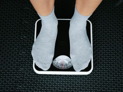 Close-up on a person's feet, showing balance and stability during an exercise.